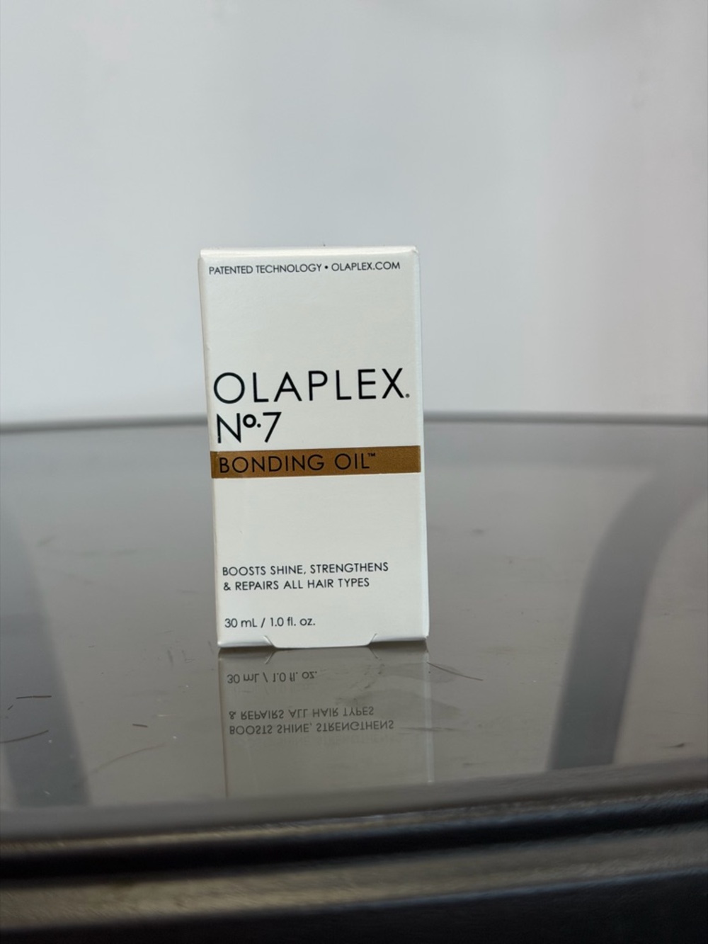 OLAPLEX No.7 Bonding Oil - White & Gold Accent